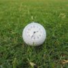 Golf-Ball-Clock-Keychain-Precise-Durable-Front-on-Grass